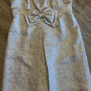 Elegant Golden Brocade Dress with Bow